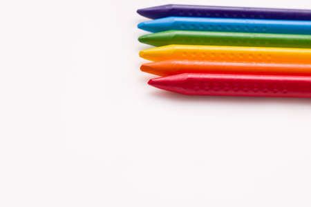 The concept of children's creativity drawing. Crayons on a white background. Copy space. Bannerの写真素材