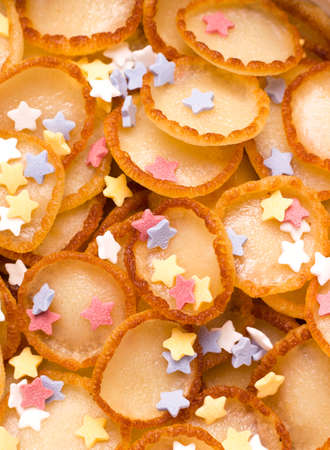 Tiny pancake cereal cheerful breakfast with dusting texture. vertical photoの写真素材