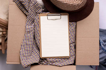 Concept of donation, sending care. In box stuff and blank copy spaceの写真素材
