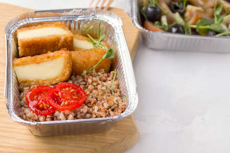 Wholesome and vegan food delivery on a white background. Copy spaceの写真素材