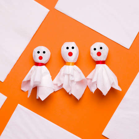 DIY Halloween candy ghost step by step. Image four. Draw ghosts eyes and mouth. Done