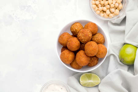 Falafel middle eastern vegan chickpea dish on white plate. Copy spaceの写真素材