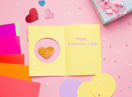 Happy Valentine's Day diy postcard step by step. Step five, sign the postcardの写真素材
