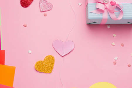 Happy Valentine's Day diy postcard step by step. Step two, stick the thread from the inside on the object that will rotate and glueの写真素材