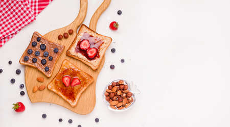 Peanut butter and jelly sandwich on a white background. copy spaceの写真素材