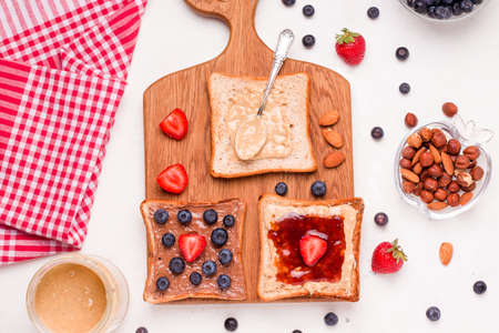 cooking peanut butter and jelly sandwich. view from aboveの写真素材