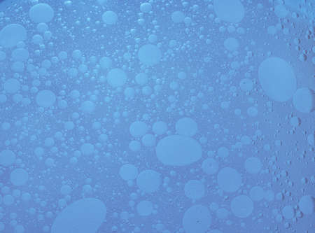 Texture of air bubbles in oil in water. Blue colorの写真素材