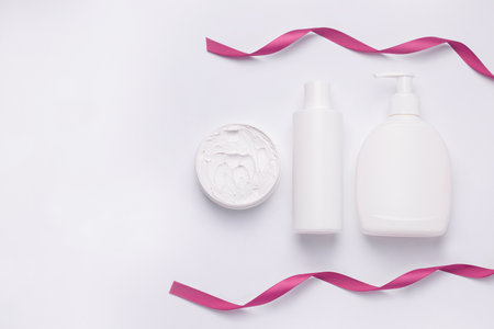Mockup of a gift set of cosmetics for a shower on a white background. Copy spaceの写真素材