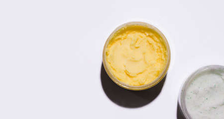 Body scrub in jars on a white background. copy spaceの写真素材