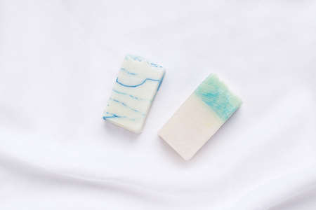 Handmade soap on white linen fabric