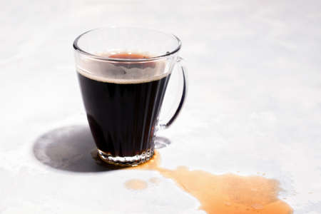 Black coffee on a light gray background. Copy space.の写真素材