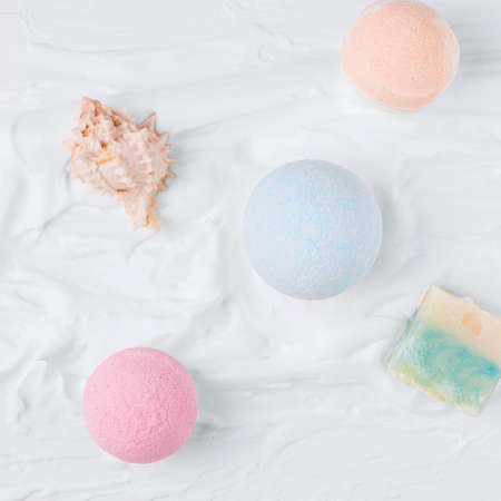 Bathroom set. Bathing bombs next to soap. View from aboveの写真素材