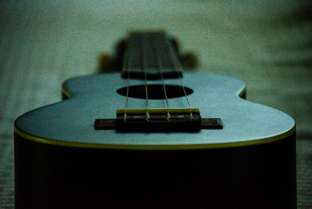 black ukulele closeupの写真素材
