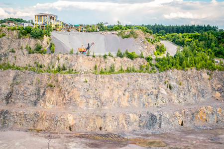 panorama of granite quarry with the machines to work, general viewの写真素材