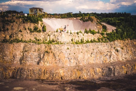 panorama of granite quarry with the machines to work, general viewの写真素材