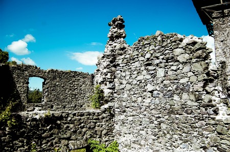 old ruins of stone old castle on a sunny day, the filterの写真素材