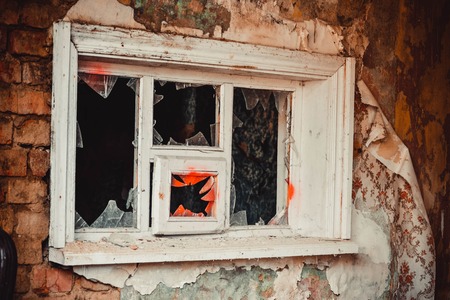 broken glass in an old window frame, filterの写真素材