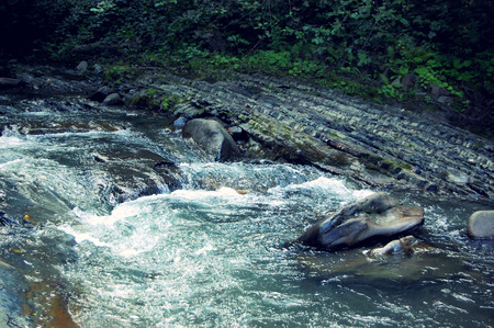 Big creek  in the rocks with a blue filter