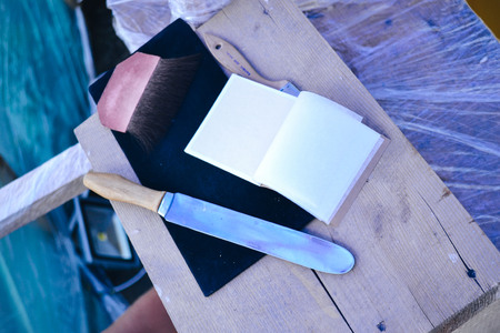 tools for working with gold leaf  close-upの写真素材