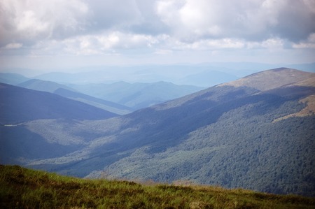 Carpathian mountain landscape with fog, haze filterの写真素材