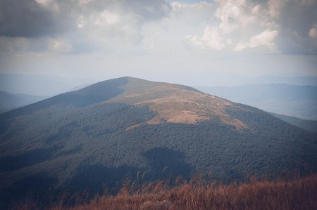 Mount with a bald vertex on a cloudy day filterの写真素材