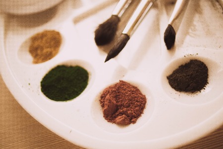 paint pigment powder poured in a paletteの写真素材