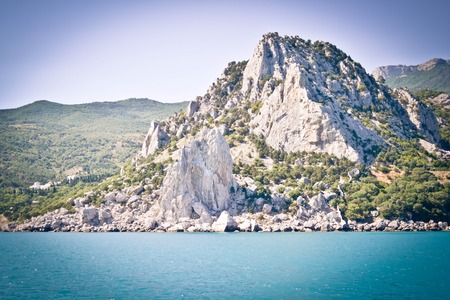 cliff, rocks in the sea with filterの写真素材