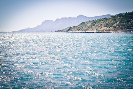 sea and coastline with mountains with filterの写真素材
