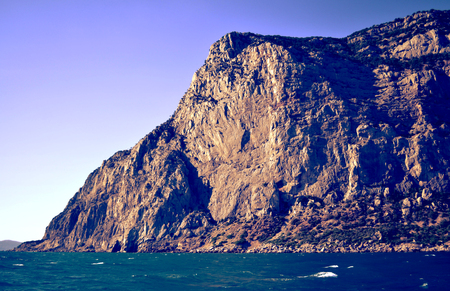Mountain rock cliff near the sea, Crimea filterの写真素材