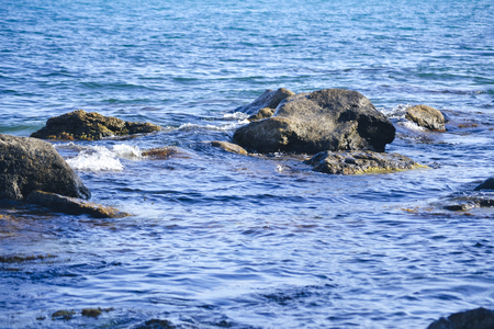 big wet stones in the water close-up, filterの写真素材
