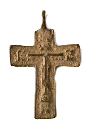 ancient and small pectoral crosses on the neckの写真素材