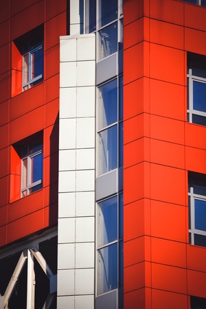 facade, front of the house red and gray in the high-tech style different details on a bright sunny dayの写真素材