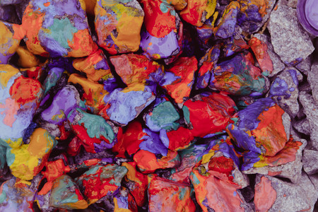 view from above, flat line stones covered with colored paintの写真素材