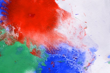 Multicolored paint stains, drips, splashes, mixing. Abstract backgroundの写真素材