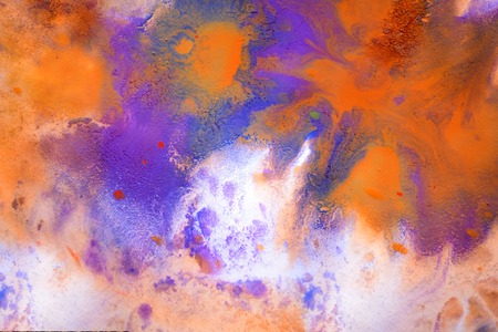 Multicolored paint stains, drips, splashes, mixing. Abstract colorful backgroundの写真素材