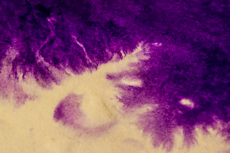 Purple Ink Spread and Absorbed Over White Close-up Paper. Abstract Background Dark Filter. Ink Stains Spread Out and Absorbed Into the Paper Macro.の写真素材