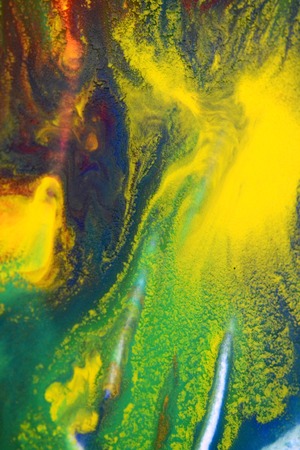 Red, green, blue, yellow fluid chaotic mix of colors macro. Abstract color creative art background basis closeup.Beautiful Perfect Wonderful Great extraordinary mixing transfusion of colors. Absorbsの写真素材