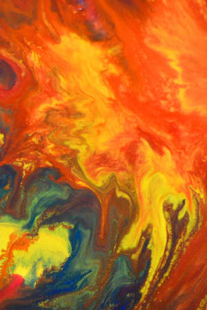 Red, green, blue, yellow fluid chaotic mix of colors macro. Abstract color creative art background basis closeup.Beautiful Perfect Wonderful Great extraordinary mixing transfusion of colors. Absorbsの写真素材
