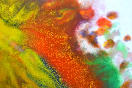 Red, green, blue, yellow fluid chaotic mix of colors macro. Abstract color creative art background basis closeup.Beautiful Perfect Wonderful Great extraordinary mixing transfusion of colors. Absorbsの写真素材