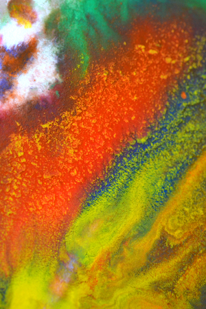 Red, green, blue, yellow fluid chaotic mix of colors macro. Abstract color creative art background basis closeup.Beautiful Perfect Wonderful Great extraordinary mixing transfusion of colors. Absorbsの写真素材