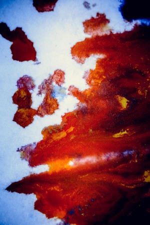 bursts of multicolored paints and mixed together white paper. Drawn splashes of paints of different...