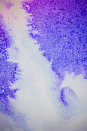 Blue and pink ink on white paper conveyed over close-up. Figure drawing resembles frost on the window, snowflakeの写真素材