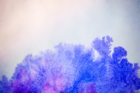 Blue and pink ink on white paper conveyed over close-up. Figure drawing resembles frost on the window, snowflakeの写真素材