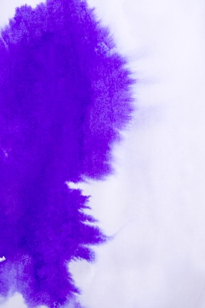 Blue and pink ink on white paper conveyed over close-up. Figure drawing resembles frost on the window, snowflakeの写真素材