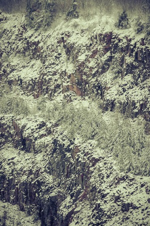 snow-covered slopes of the granite quarry filter natural backgroundの写真素材