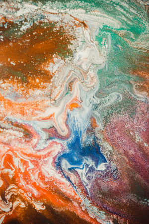 spreads colored ink colors on white background. Abstractly spreads dye ink red, green, yellow, orange, blue background on paper. Art Creative abstract background. Colorful backgroundの写真素材