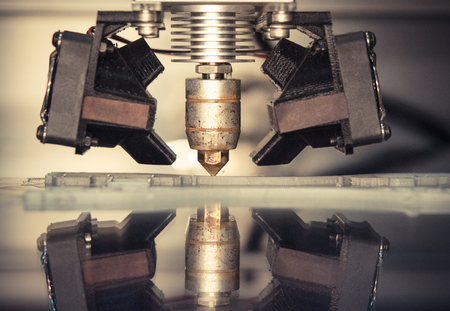 3D printer print isolated objects on mirror reflective surface close-up. Modern 3D printing technologyの写真素材