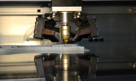 3D printer print isolated objects on mirror reflective surface close-up. Modern 3D printing technologyの写真素材