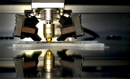 3D printer print isolated objects on mirror reflective surface close-up. Modern 3D printing technologyの写真素材