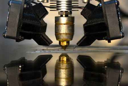 3D printer print isolated objects on mirror reflective surface close-up. Modern 3D printing technologyの写真素材
